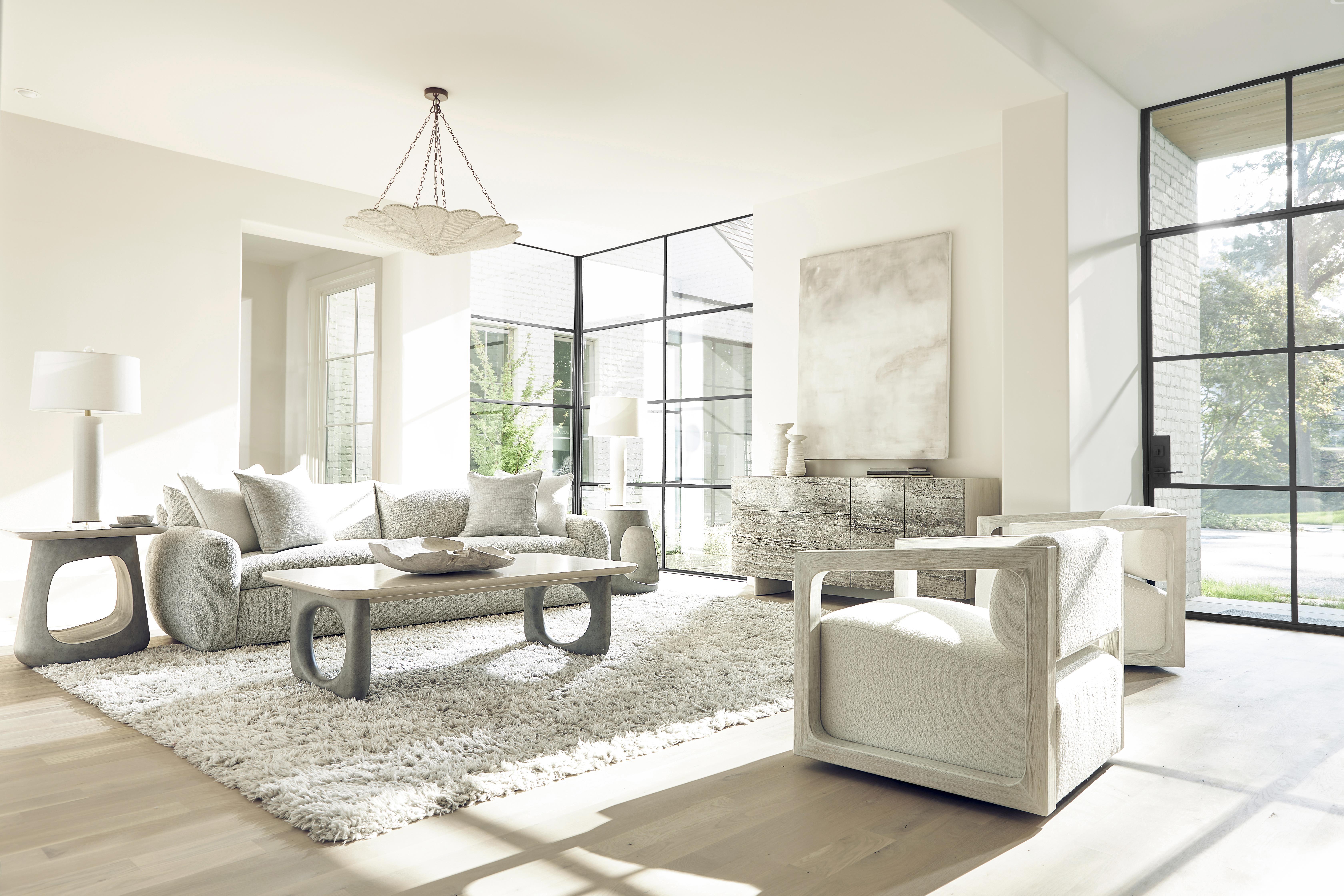 Explore the sculptural beauty of curved silhouettes and fluid form in a curated selection of Bernhardt accent tables.
