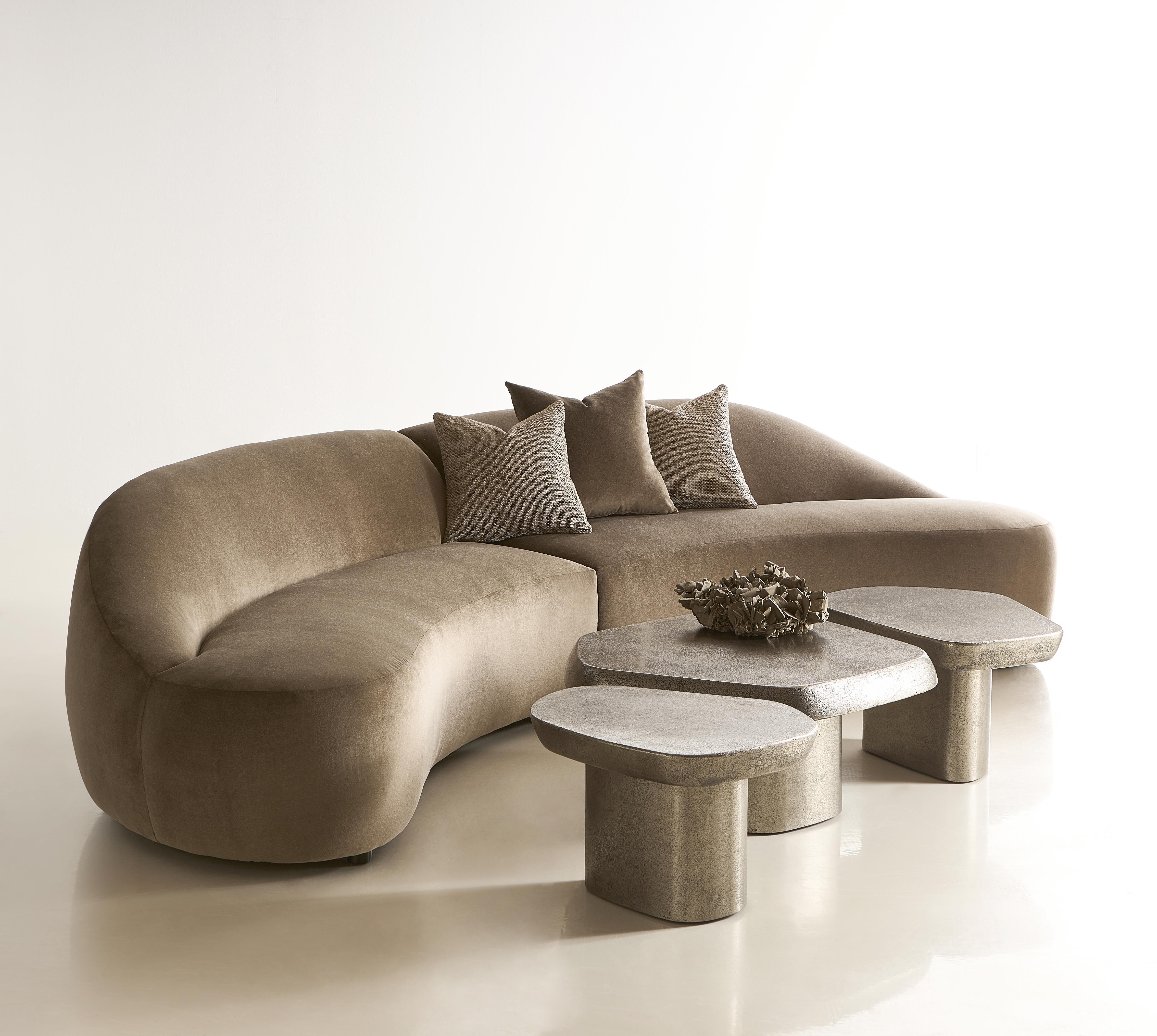 Explore the sculptural beauty of curved silhouettes and fluid form in a curated selection of Bernhardt accent tables.