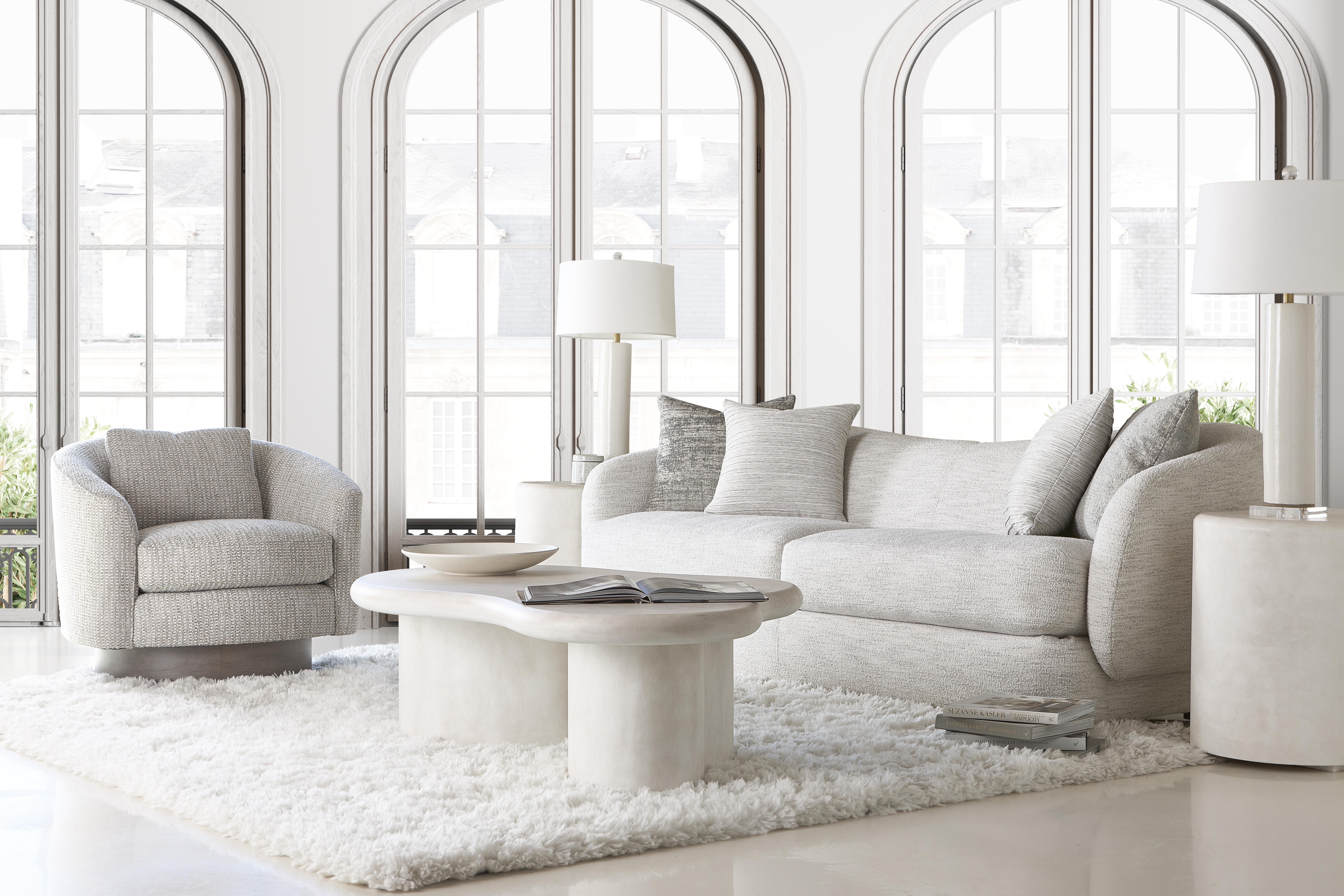 Explore the sculptural beauty of curved silhouettes and fluid form in a curated selection of Bernhardt accent tables.